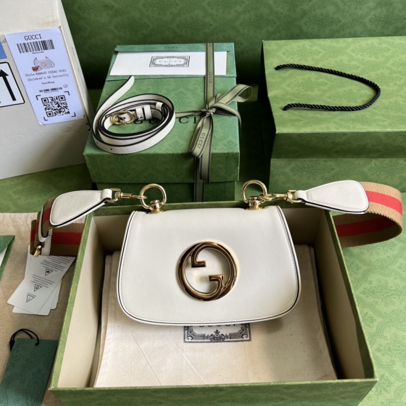 G*u*i satchel bags